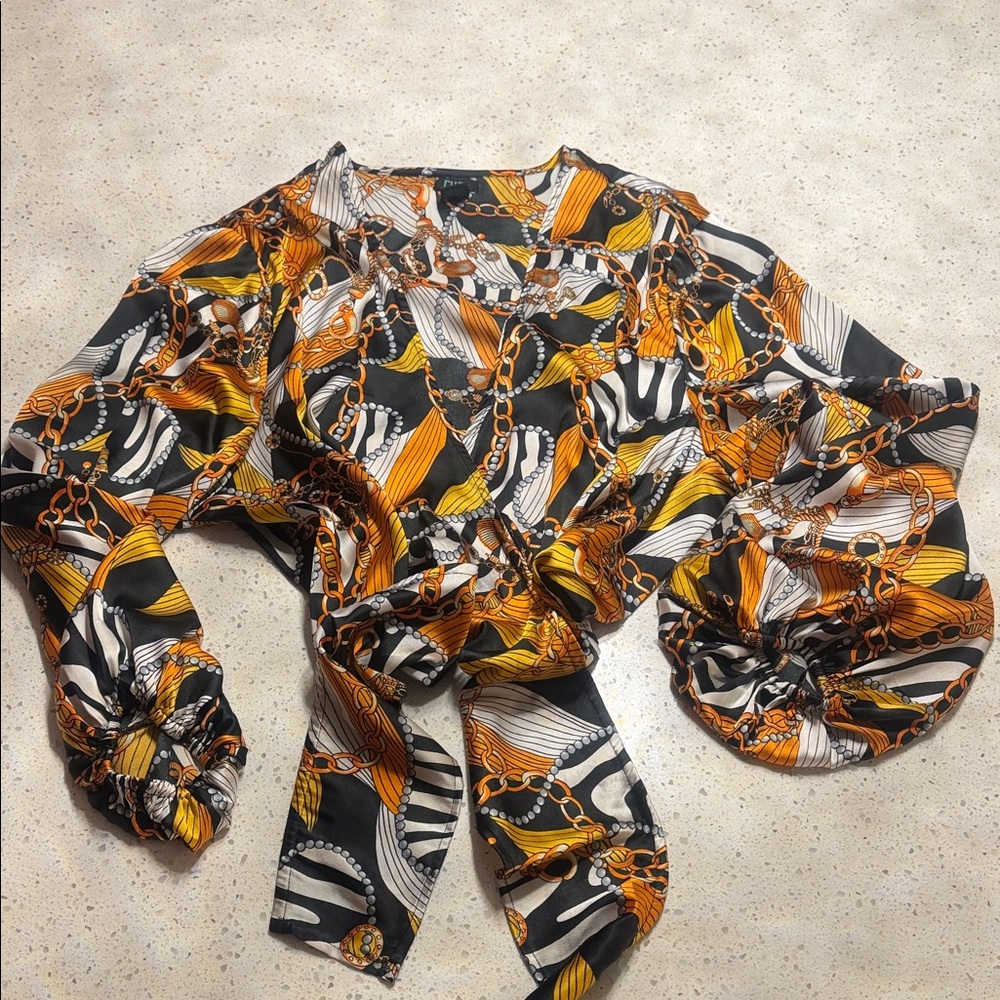 Vibrant Patterned Blouse with Chain Design